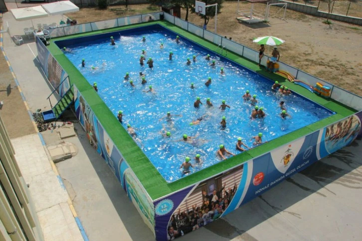 Çocuklar için her mahalleye portatif havuz kurulmalı